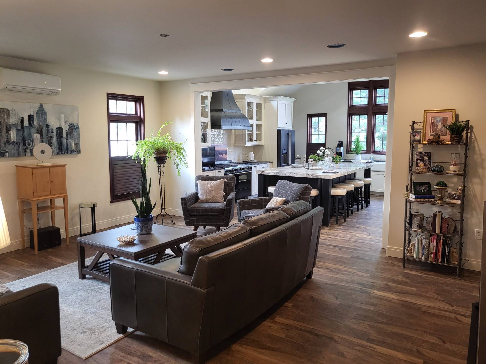 Living room view towards kitchen. Designed by Brad M. Zahm, RA, NCARB and The Mula Group.